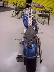 custom bike in candy blue flames and nitro tank.jpg